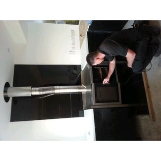 Stainless steel woodburning range cooker with a stainless steel flue