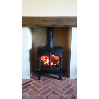 Dark oak Geocast beam and brick hearth
