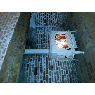 Jotul F500 woodburner with tracery door in ivory enamel