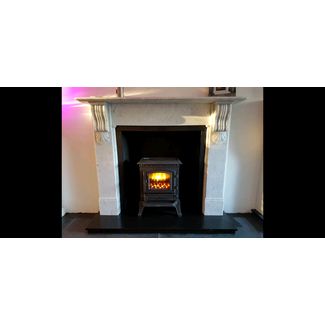 Broseley York clear door cast iron electric stove and marble mantel