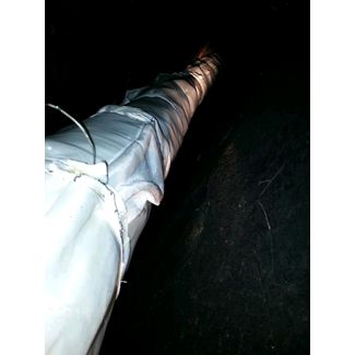 Flue liner wrapped with chimwrap insulation blanket