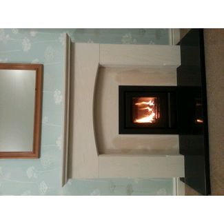 Stovax Riva 40 inset stove with Portuguese limestone mantel