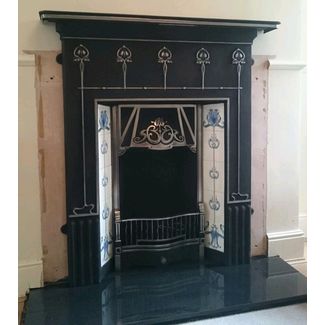 Cast iron combination tiled fireplace surround