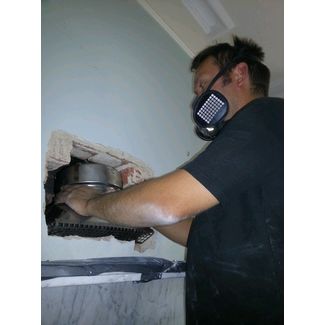 Fitting a stainless steel gather adaptor for lining a chimney for an open fire