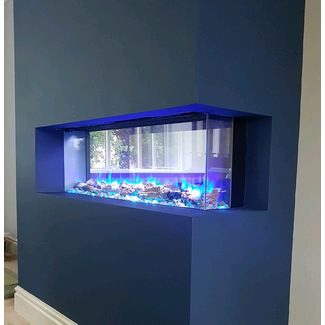 Gazco Skope inset 2 sided electric fire with a false chimney breast